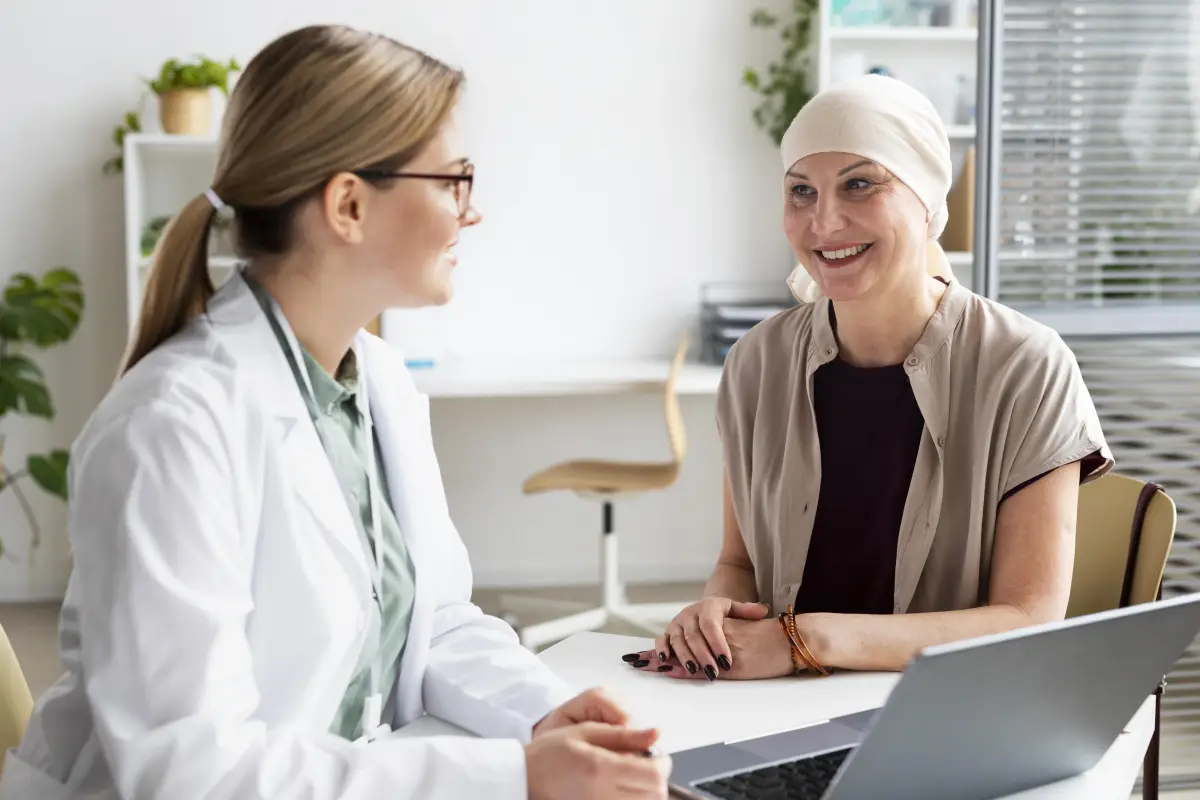 Doctor consultation patient - cancer treatment private clinic UK